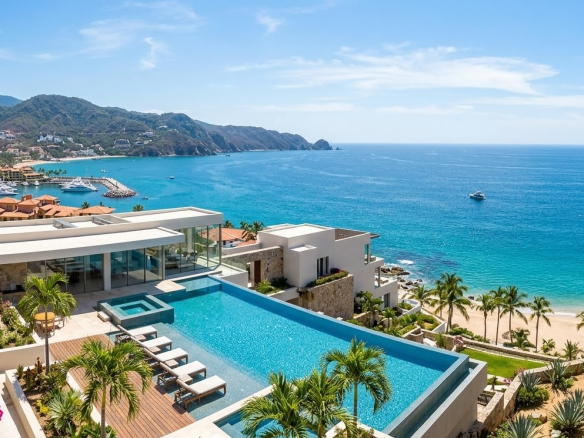 Modern luxury real estate property in Mexico featuring premium amenities and coastal views for high-end investment.